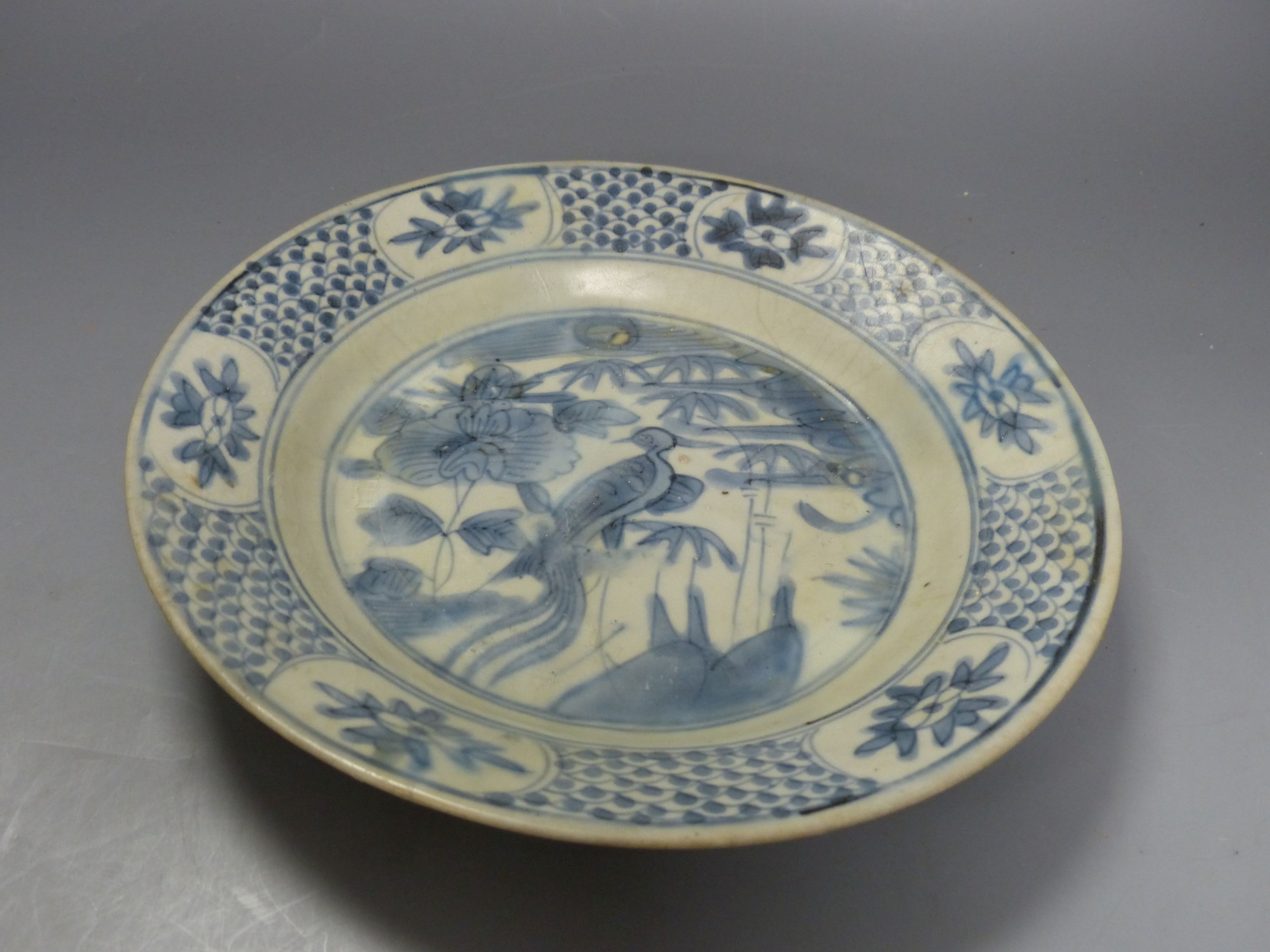 A Chinese Swatow ware blue and white dish, early 17th century, diameter 26cm